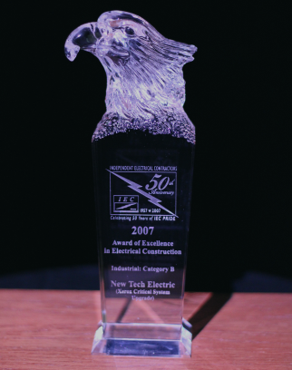 Glass award with eagle Award of Excellence in Electrical Construction