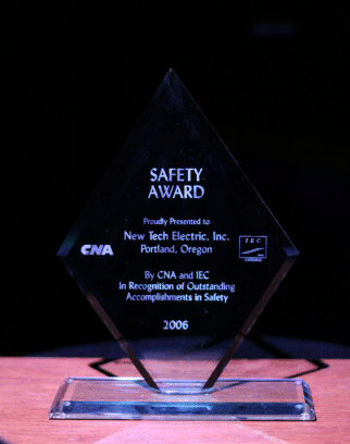 Upclose image of glass safety award for New Tech Electric Inc